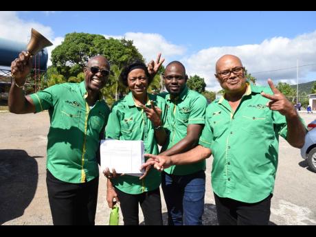 Dwight Sibblies (left), member of parliament, Clarendon Northern, poses with his councillor-candidates (from second left) Marjorie McLeod-McFarlane, Aenon Town division; Copeland Sewell, Crofts Hill division; and Noel Nembhard, Kellits division.