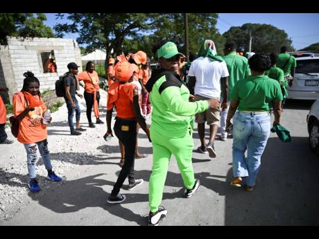 Supporters of the PNP and JLP are seen at Yallahs Primary School in St Thomas on nomination day.