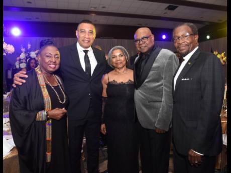 Prime Minister Andrew Holness (second left) poses with Olivia ‘Babsy’ Grange (left), minister of culture, gender, entertainment and sport; Carmen and Edmund Bartlett, minister of tourism, and Ambassador N. Nickolas Perry (right), United States ambassad