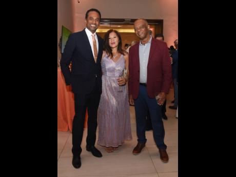 From left: Dr Carey Wallace, executive director, Tourism Enhancement Fund, poses with wife Vivene, managing director of Great Huts, and Fred Smith, managing director of Tropical Tours.