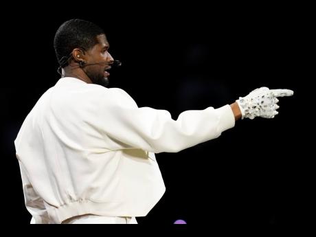 Usher performs during halftime of the NFL Super Bowl 58 football game between the San Francisco 49ers and the Kansas City Chiefs on Sunday, in Las Vegas. 