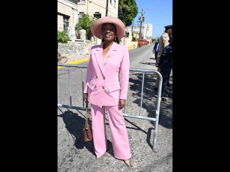 Left: Senator Janice Allen was giving ‘Politician Barbie’ in this double-breasted suit from Earl’s Fashion and a vintage hat from her mother’s closet.  