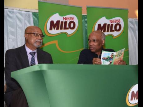 Ray Harvey (left), chairman, Western Relays with Christopher Samuda, president of  the Jamaica Olympic Association  at the official launch of the Milo Western Relays in Montego Bay on Tuesday, January 23.