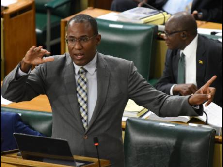 Finance and the Public Service Minister Dr Nigel Clarke addresses Parliament as he tables the 2024-2025 Estimates of Expenditures in Gordon House in Kingston on Thursday.