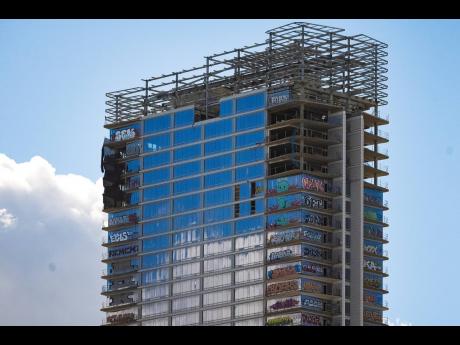 An unfinished high-rise development in the downtown entertainment district that has become the target of graffiti taggers who have struck dozens of floors is seen in Los Angeles.