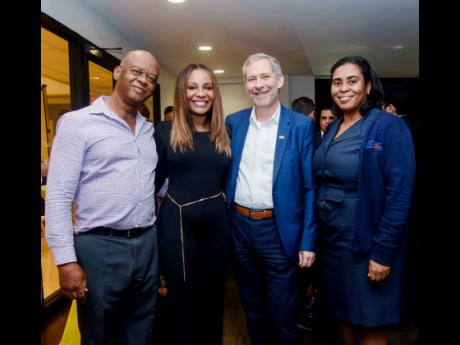 
(From left) Tourism stalwart Fred Smith, Belinda Williams, lead corporate affairs and communication, National Commercial Bank (NCB), Bruce Bowen, CEO, NCB and Roxanne Smith, managing director, Tropical Tours Limited, pause for a photo during the NCB’s T