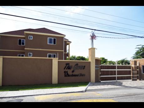 The Charlemont Drive, St Andrew, apartment complex constructed by Mark Barnett, president of the state-owned National Water Commission, his wife Annette, and developer Phillip Smith.