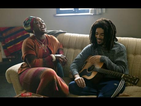 This image released by Paramount Pictures shows Kingsley Ben-Adir, right, and Lashana Lynch in 'Bob Marley: One Love'. 