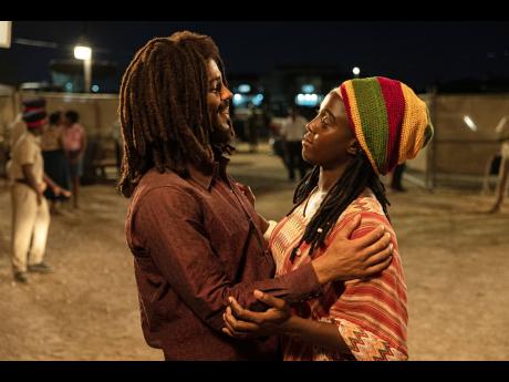 Kingsley Ben-Adir, who plays Marley left, and Lashana Lynch who takes on the role of his wife, Rita, in a scene from the biopic,  ‘Bob Marley: One Love’.