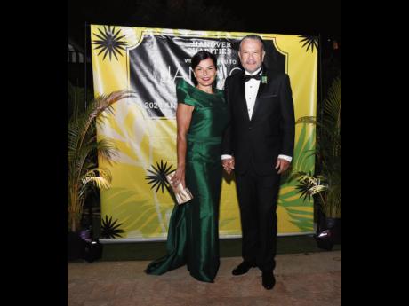 Capturing the camera’s attention, Rose Tavares-Finson stunned in an emerald-green gown while standing beside her husband, Senator Tom Tavares-Finson, president of the Senate of Jamaica.