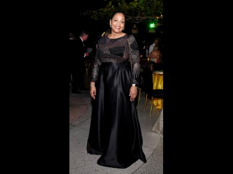 Camille McDonald, operations manager at Georgia Primary Bank in Atlanta, adorned herself in a black gown with rose-coloured highlights for the special occasion.