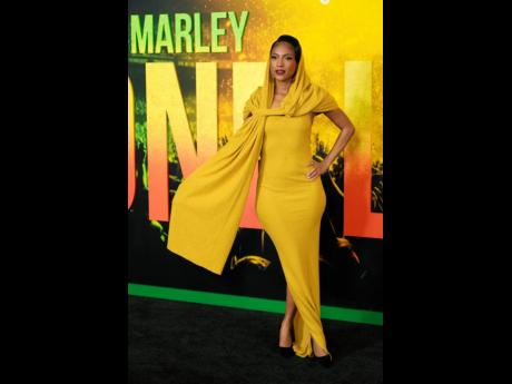 Styled by Ivy Coco Maurice, Naomi Cowan paid tribute to her character, Marcia Griffiths on the red carpet of the London premiere of ‘Bob Marley: One Love’ in this ‘Naturally’ majestic dress designed by West African designer Kwame Adusei based in th