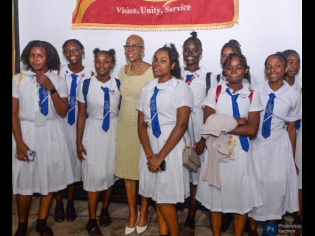 Minister of Education and Youth Fayval Williams, shares a moment with students from the all-girls Mount Alvernia High School in Montego Bay, St James, at a ‘Rapping with the Minister’ forum held at Jamaica College, St Andrew, on Tuesday.