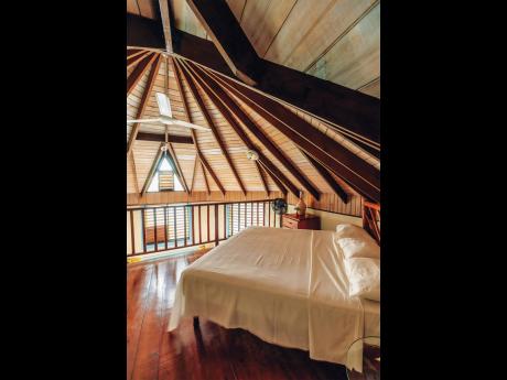 An adventuresome sleeping loft area hidden in the roof.