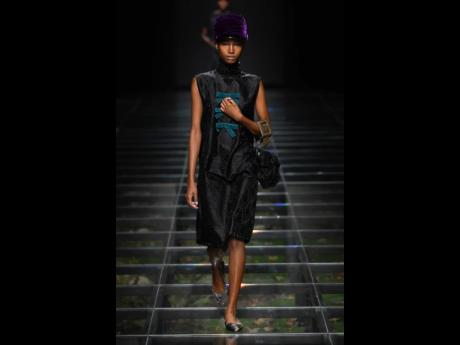 SAINT International’s newly minted fashion star Dru Campbell on the runway for Prada’s Fall/Winter 2024 collection in Milan last Thursday. Campbell, a fifth-form student at Edwin Allen High School, won SAINT’s 2023 Female Fashion Face of the Caribbea
