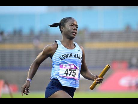 Edwin Allen's Reneica Edwards anchors the team to  victory in the girls' Class 2 400x100 metres at the Gibson McCook Relays at the National Stadium yesterday.