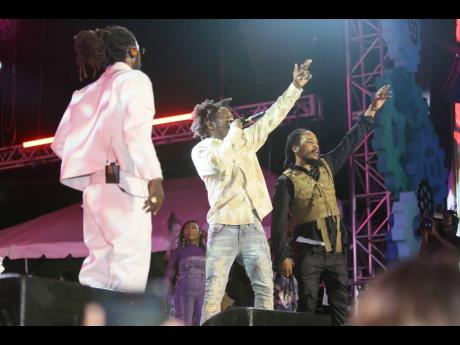 While Jesse Royal (left) looks on Jahshii (centre) and Yohan Marley  deliver a mash-up of their songs. 