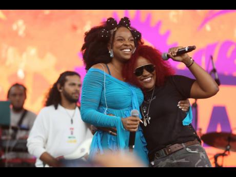 Reggae newcomer Khalia gets the stamp of approval from seasoned vet Tanya Stephens on stage at Lost In Time Festival. 