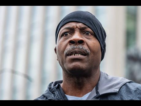 Carlis Thompson, cousin of slain Run-DMC star Jam Master Jay, speaks to media outside the United States Eastern District Courthouse in Brooklyn, New York, on Tuesday.