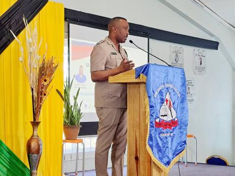 Senior Superintendent of Police in charge of St James, Vernon Ellis  addressing the Sam Sharpe Teachers’ College’s staging of its Research Day session at its campus in Granville, St James, on Wednesday.