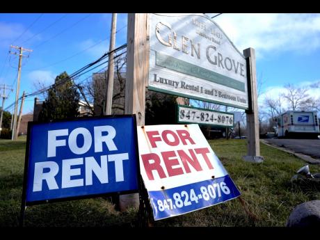 
‘For rent’ signs are displayed outside a development in Glenview, Illinois, on Monday, January 29, 2024.