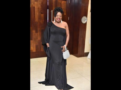 Senior Gleaner Writer Janet Silvera wowed in black with silver accessories ahead of her induction.
