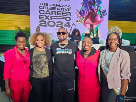 Minister of Culture, Gender, Entertainment and Sport Olivia Grange (second right) poses with Grammy award-winning entertainer, Sean Paul (centre), and American actress, Sundra Oakley (second left), during the recent Jamaica Creative Career Expo, which was 