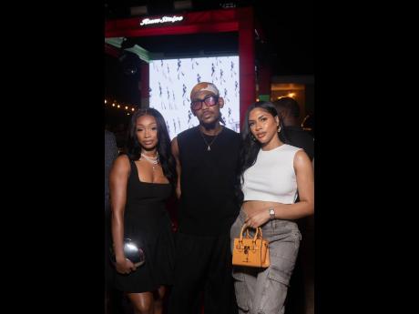 Fashion favourites (from left) Tavion Telfer, Rushane ‘RushCam’ Campbell and Shacqueal Witter grace the GenXS carnival season launch event in  fashionable  looks.