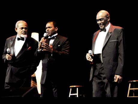 Dem 3 Jamaican Tenors in performance. From left; Cecil Cooper, Steve Higgins and David Reid.