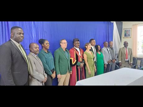 From left: Orton Manahan, councillor for Hope Bay; Wayne McKenzie of Prospect; Shanique Green of Fellowship; West Portland MP Daryl Vaz; Mayor Paul Thompson; East Portland MP Annmarie Vaz; Deputy Mayor Rohan Vassel of Balcarres; Dion Hunter of Buff Bay; At