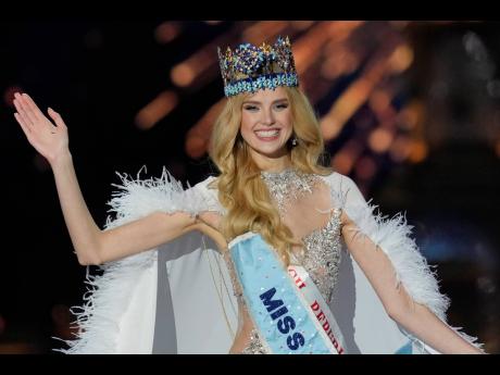 Krystyna Pyszková of Czech Republic waves after she was crowned Miss World in Mumbai, India, on Saturday. 