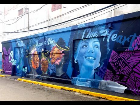 To promote unity in downtown, Kingston, Chang painted the Generational Women mural, which is located on Water Lane.