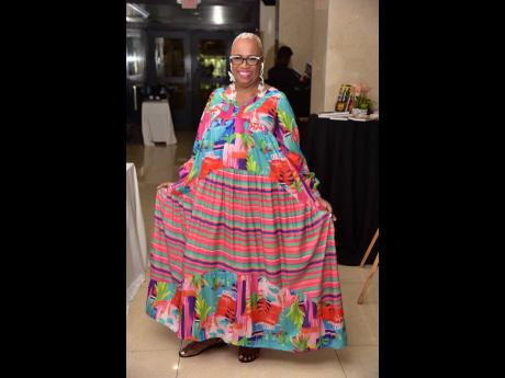 Bishop Dr Carla Dunbar chose a colourful, floral maxi dress.