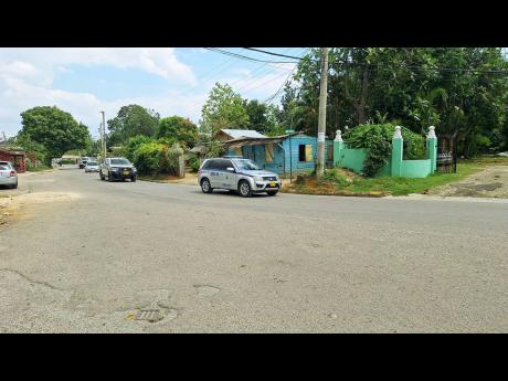 Police patrolling the space in the Grange Hill community in Westmoreland on Tuesday.
