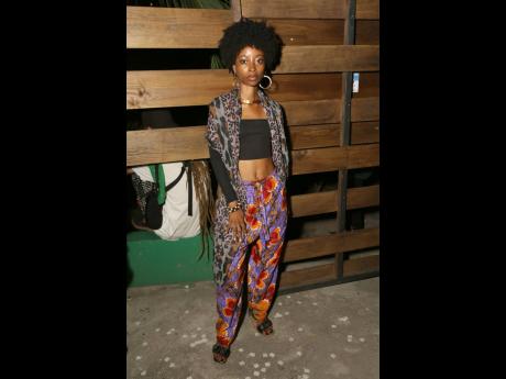  Erica Campbell made a bohemian fashion statement in hibiscus-printed harem pants.