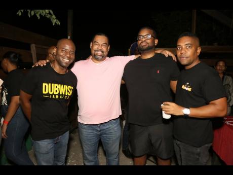 Rohan Scott, realtor associate, Keller William’s Realty, poses with Gary Peart, CEO of Mayberry Investments and executive chairman of Supreme Ventures and his son Aaron Peart and Kisero Group’s Kimani Robinson, support the women of reggae music.
