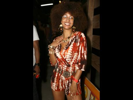 Medical student Zoe Hochtritt was '70s chic in a tie-dye romper, accessorised with boho accessories and her beautiful afro.