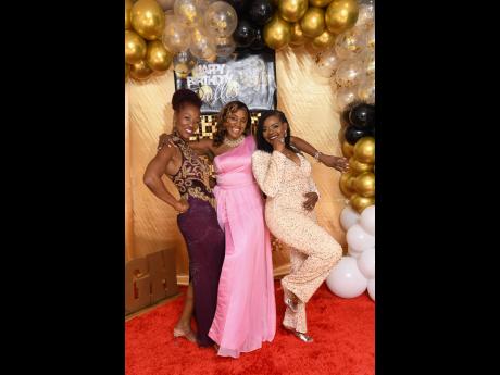 From left: Millicent Lynch, Lorraine Williams and Winsome McLeod were having a grand time.