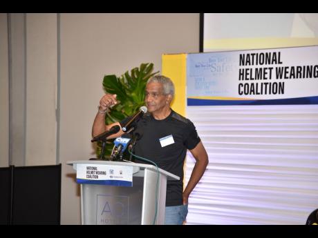 Crash survivor John McFarlane sharing his 1970’s crash experience with the audience at the launch of the National Helmet Wearing Collation held yesterday at the AC Marriot Hotel.