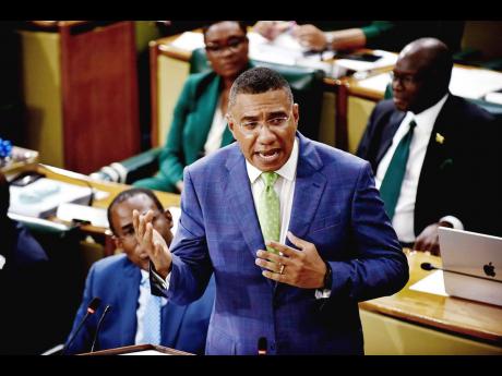 Prime Minister Andrew Holness giving his speech for the 2024-2025 Budget Debate in George William Gordon House yesterday.