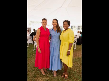 Stylish in coloured maxi dresses are (from left) MFG alumni, attorney-at-law Tricia Gaye O’Connor, MFG partner Simone Bowie Jones and Misheca Seymour-Senior, group chief compliance officer at NCB Financial Group. 