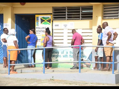 People wait for their turn to cast their votes at Granville Primary School for local government election. Gordon Robinson writes: Like Geraldine Jones, Jamaican voters are faced with similar the-devil-made-me-so-it choices in every election.