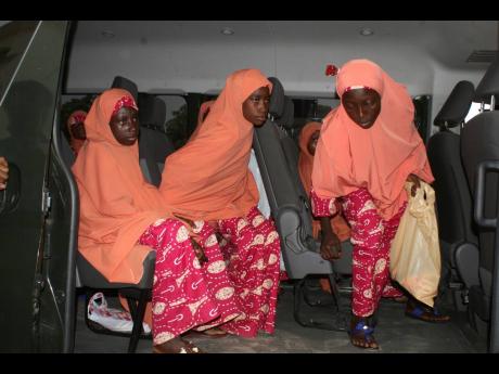 The freed students of the LEA Primary and Secondary School Kuriga upon their arrival at the state government house in Kaduna, Nigeria, Monday, March 25, 2024. More than 130 Nigerian schoolchildren rescued after more than two weeks in captivity have arrived