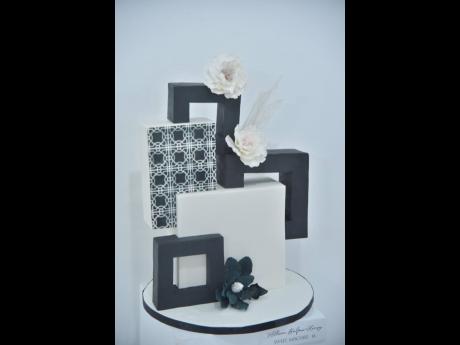 Classic meets chic for Allison Balfour-Henry’s black and white cake masterpiece.
