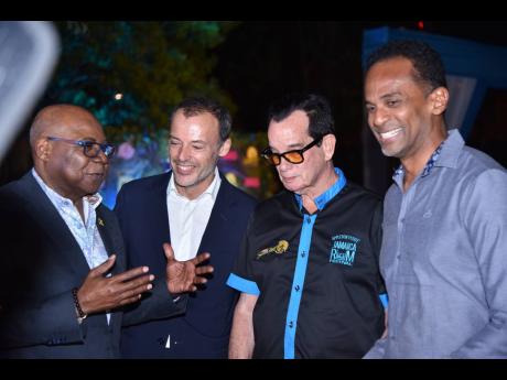 From left: Tourism Minister Edmund Bartlett; Marketing Manager at J Wray and Nephew, Stefano Furini; Reggae Sumfest owner, Josef Bogdanovich; and Executive Director of the TEF, Dr Carey Wallace, in discussion at the launch of the Appleton Estate Jamaica Ru