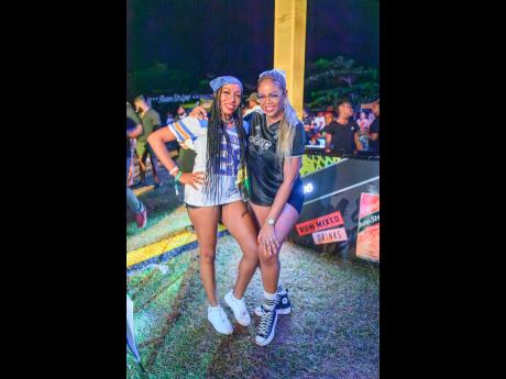 Shanice Buchanan (left) and Marvia Chevannes were decked out in their jerseys at the Rum Stripe-sponsored Strictly 2K.