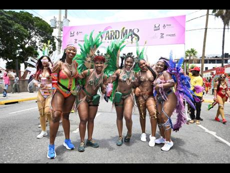 Here, revellers in the Yard Mas Road March are seen soaking up last year’s festivities. As Carnival Sunday approaches, Dr. Guthrie advises that when selecting footwear for the road, prioritising comfort is essential. 