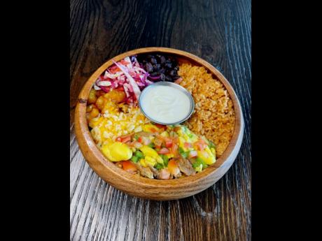 Capturing the taste of ‘where Mexico meets Jamaica’, this burrito bowl just got better with the island’s national dish, ackee and salt fish.