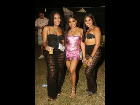 RYTZ brought in the glamorous ladies! Bestie trio (from left) Erin Facey, Shamika Davis, and Brittne-René Williams wore big smiles as they enjoyed Kes’s performance.