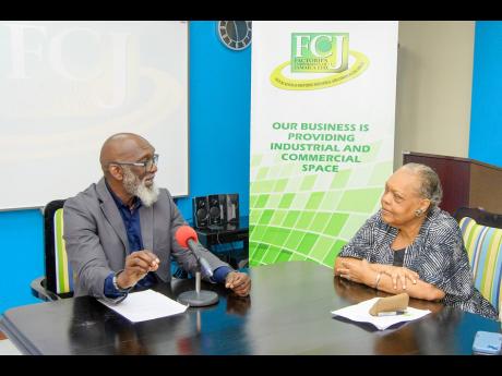 Valerie Veira, chief executive officer of the Jamaica Business Development Corporation, and Dr Donald Farquharson, managing director of the Factories Corporation of Jamaica.